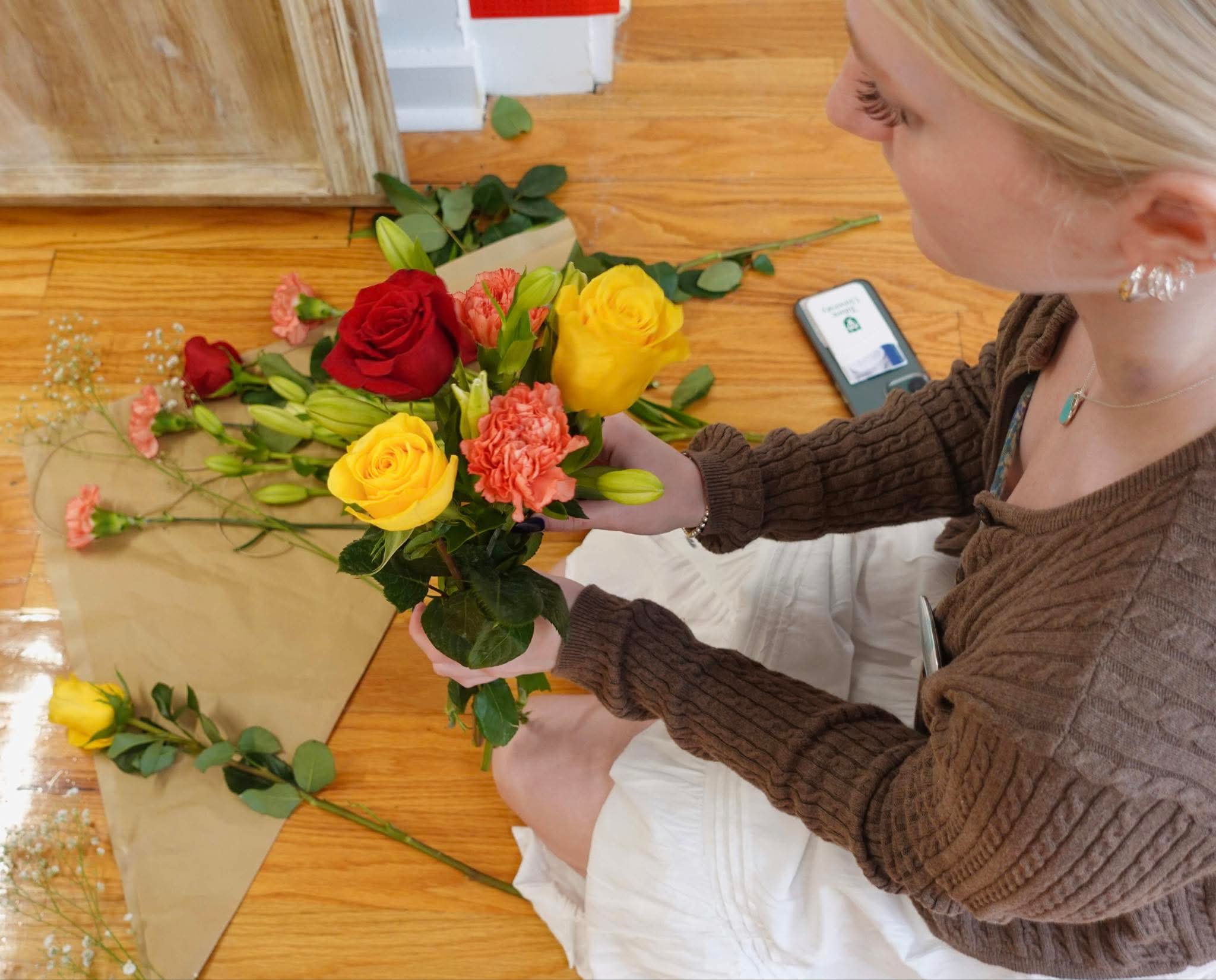 Behind the scenes floral arrangement in progress