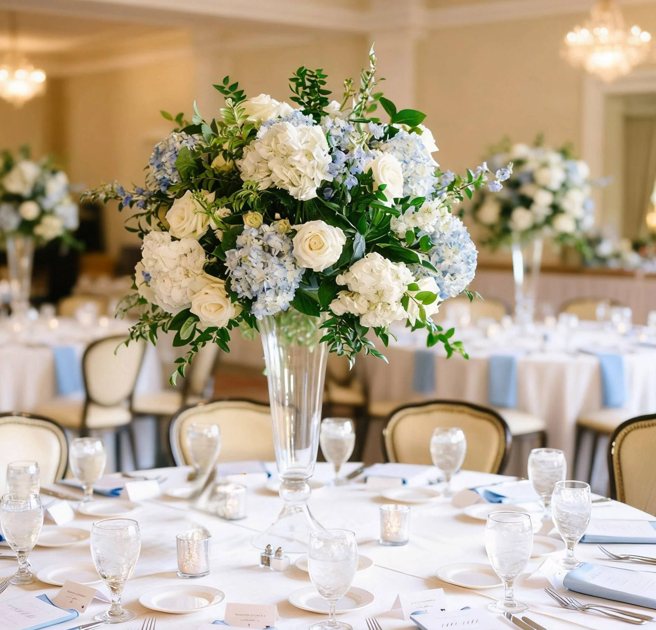 Blue and white hydrangea centerpiece in ballroom